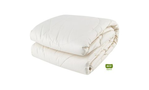 Alpakadecke als Bettdecke.