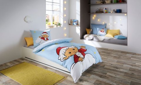 Kindebettwäsche von Fleuresse mit Sandmännchenmotiv.