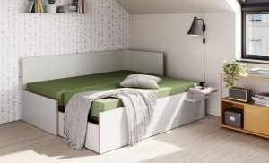 Daybett Corner von Müller Möbelwerkstätten mit ausgezogener zweiter höhengleicher Matratze. Aus einem Einzelbett wird ein Doppelbett.